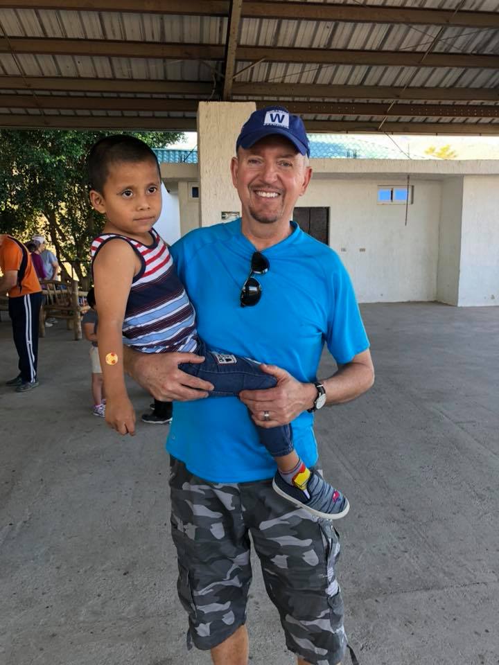 Steve McIntosh with young boy in Guatemala